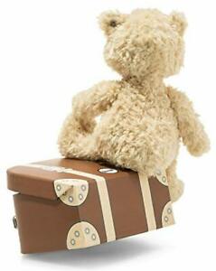 دبدوب متدلي تشارلي في حقيبة سفر